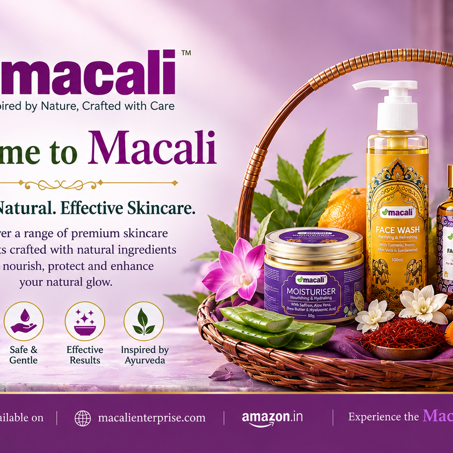 A promotional banner for Macali skincare products, featuring a wicker basket filled with face wash, serum, and a jar of face cream, alongside fresh ingredients like turmeric, ginger, oranges, and flowers, set against a purple background with brand text and icons.